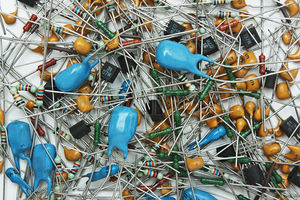 3256830-271746-heap-old-electronic-components-background.jpg